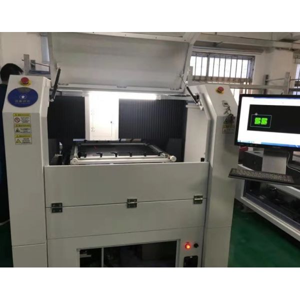 YS-GW50 laser cutting machine in operation