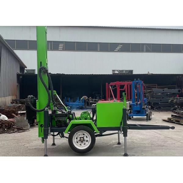 Trailer mounted drilling rig side view