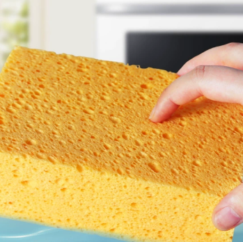Yellow Seaweed Sponge in use on kitchen surface