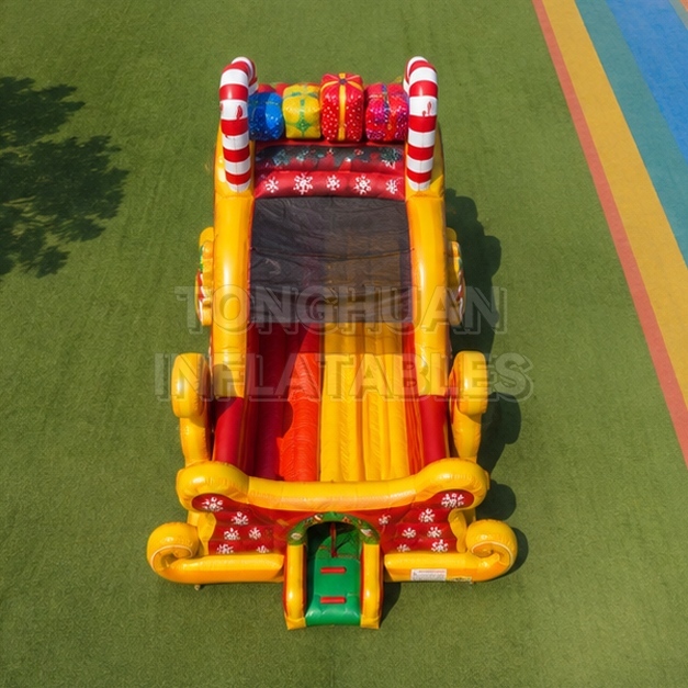 Large Christmas Theme Inflatable Slide with Sleigh Design and Holiday Decorations