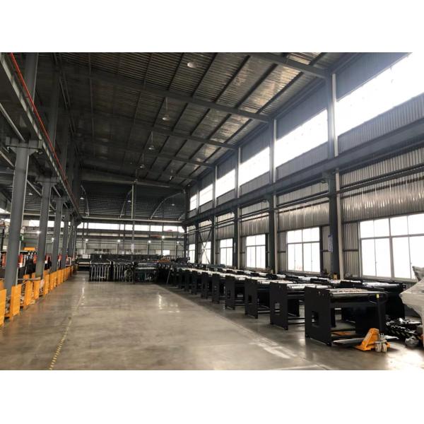 Workshop with film lamination machine