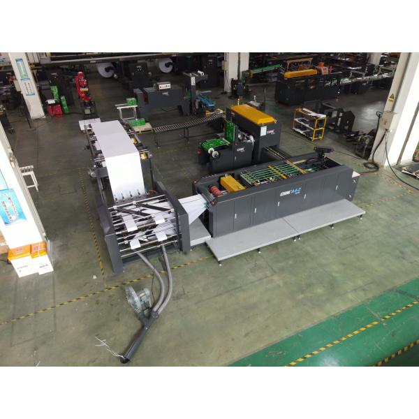 Automated packaging section showing servo-controlled mechanisms