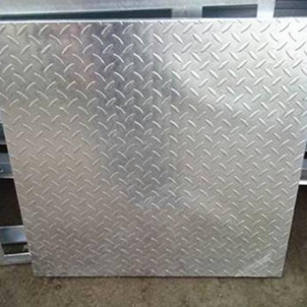 Close-up view of steel grating surface