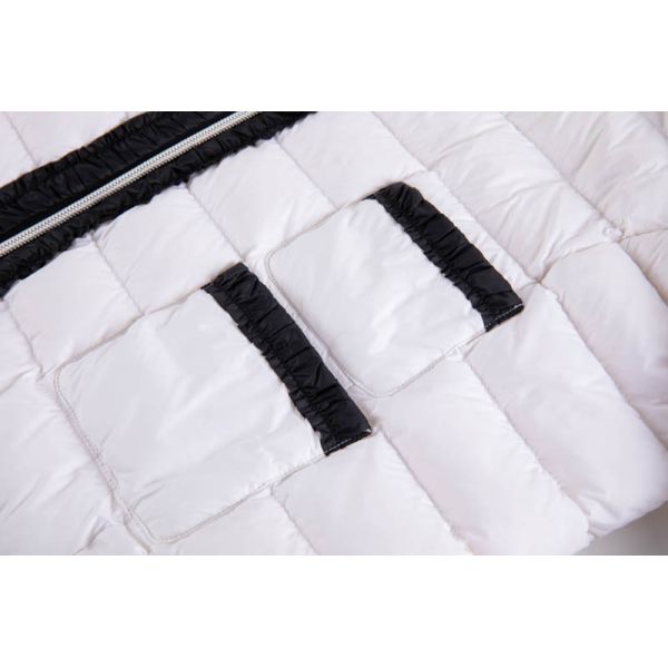 Women's lightweight quilted jacket side view displaying elegant design