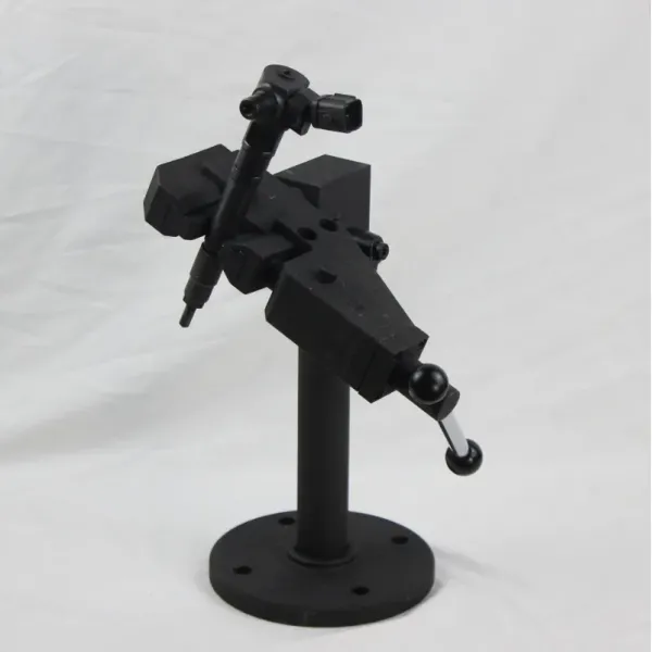 Professional injector support fixture in workshop setting