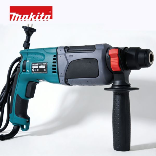 Industrial electric hammer drill - side view highlighting durable housing and power specifications