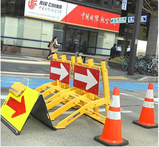 LED Arrow Collapsible Vehicle Interception Barrier deployed in construction setting