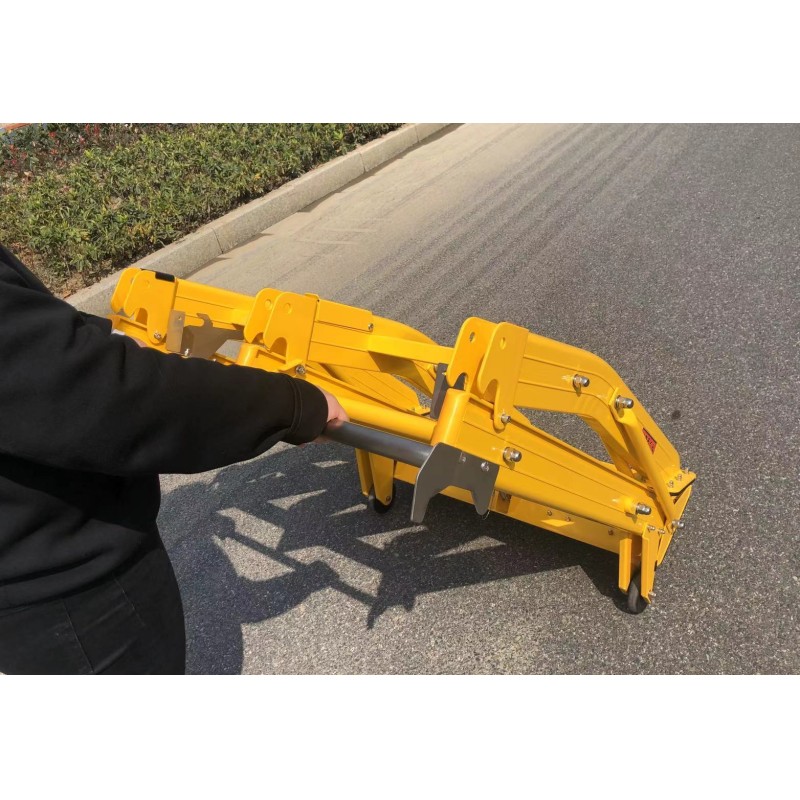 Worker easily moving the barrier using built-in casters