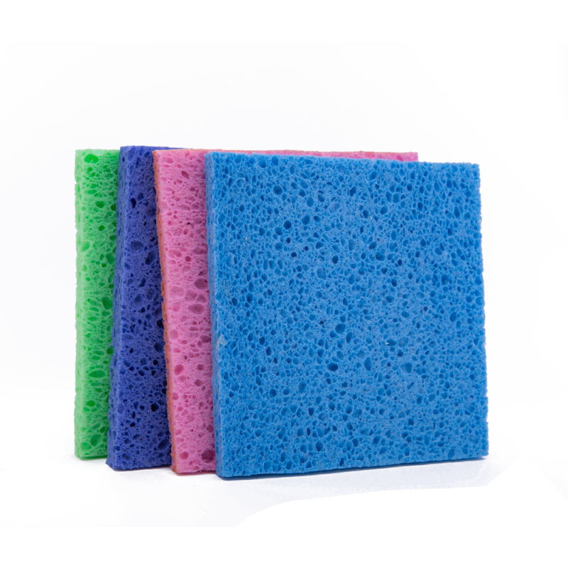 Sponge cloth in use on kitchen surface