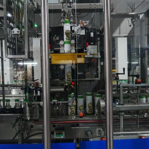 The Fully Automatic Can Sleeve Labeling Machine Was Tested In Workshop And
