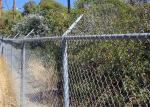 Chain wire fence protects and decorates garden and sports yard